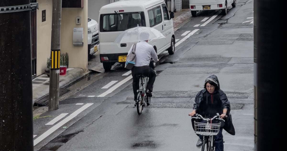 Rainy Japan street — 5 criteria to decide whether to cancel your Japan trip during a typhoon